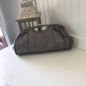 Clutch in faux animal skin